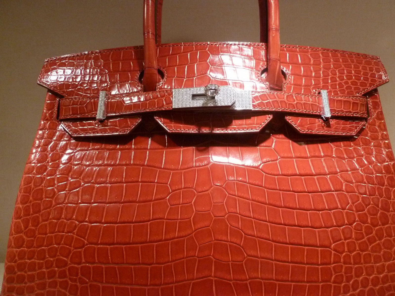 Close-up of a crocodile-leather Hermès Birkin with diamond-set hardware